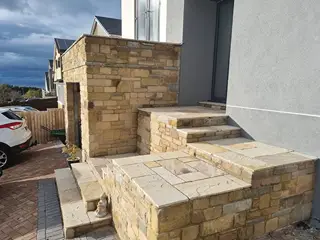 Staggered stonework & flags